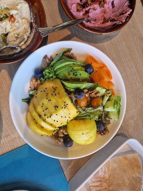 Avocado mango salad. Beetroot and regular humous in shot too at Le Pavillon Restaurant in Accra