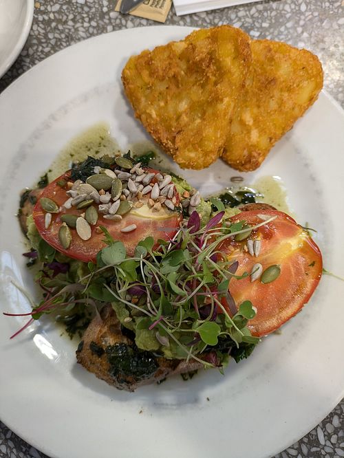 Smashed avocado on toast with a side of hash browns at Percy Thrower's Garden Centre in Shrewsbury