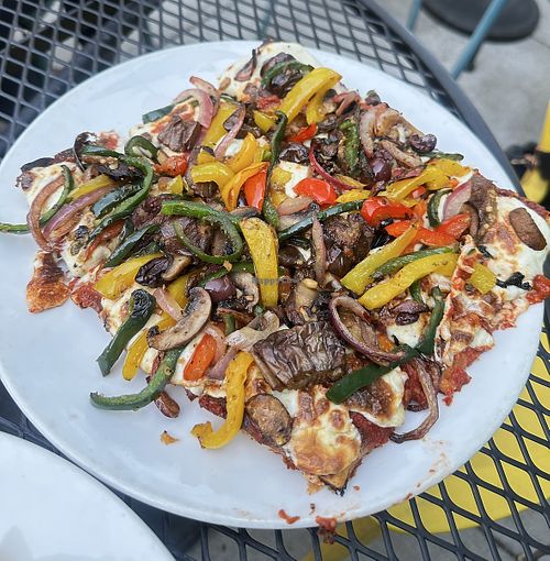 Pizza with vegan cheese and veggie toppings   at The Queensboro in Jackson Heights