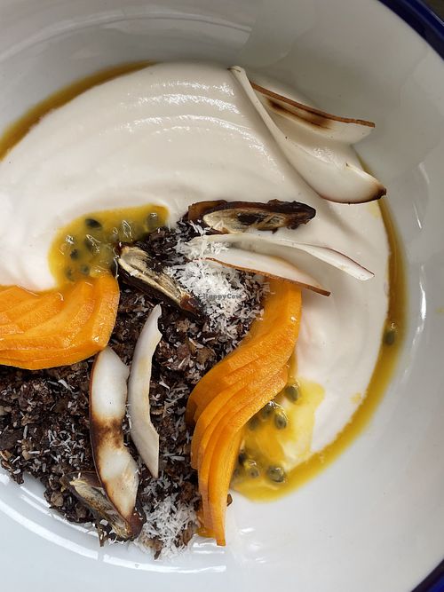 Homemade probiotics coconut yogurt with chocolate granola + fresh fruits  at Bunch in Hiriketiya