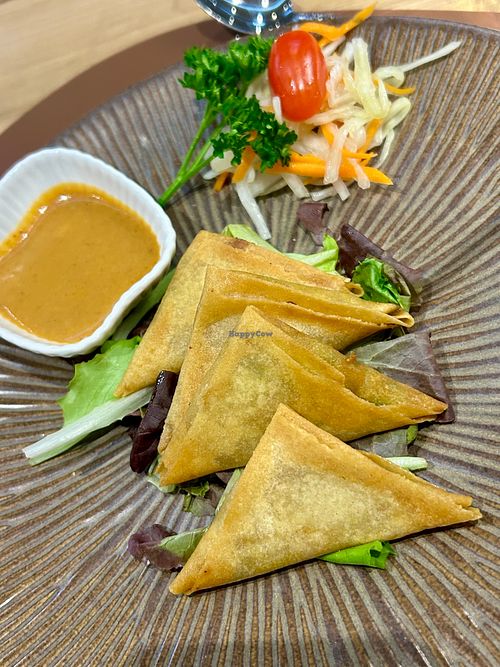 Samosa triangles with peanut curry sauce   at KO LANTA in Namur