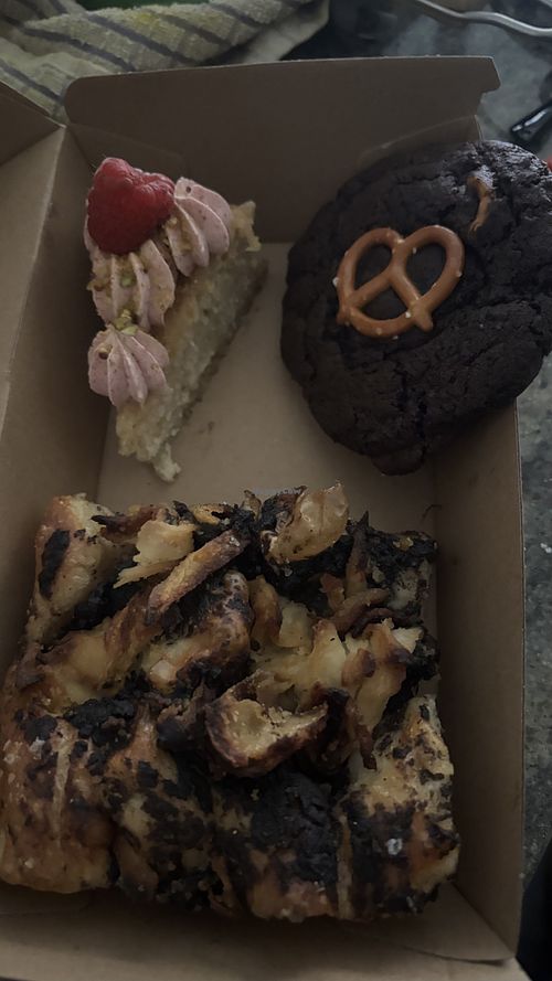 Raspberry coconut cake, chocolate pretzel cookie and focaccia. All deliciouss  at Better Now in Brunswick East