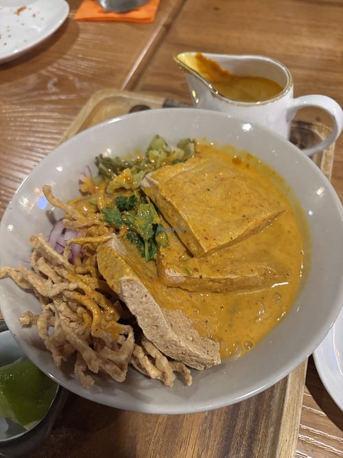 Curry noodles with fried tofu  at Thaiger Den in Malden
