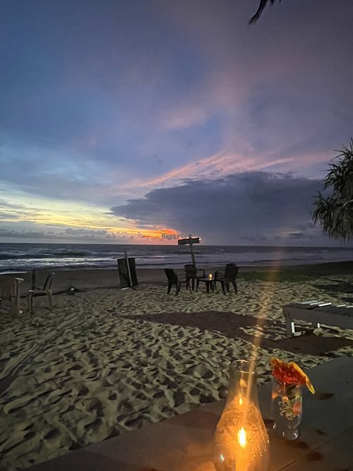 Flowers and candles for a nice atmosphere  at Green Cafe  in Hikkaduwa