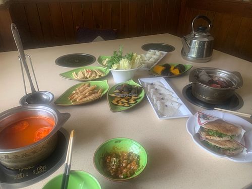 Tomato broth Hotpot + fresh veggies at One Leaf, One World - Ya'an 一叶一世界藏茶素火锅 - 雅安店 in Yaan