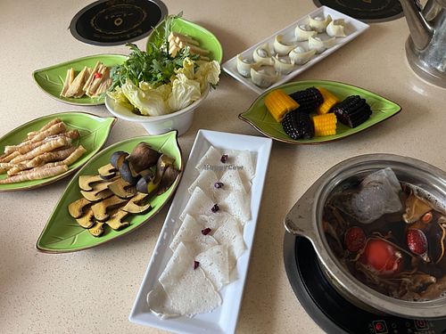 Mushroom broth Hotpot + fresh veggies at One Leaf, One World - Ya'an 一叶一世界藏茶素火锅 - 雅安店 in Yaan