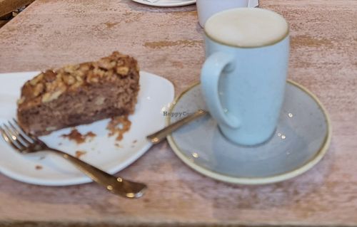 Banana cake and oat milk chai lattee  at Cake Cafe in North Berwick