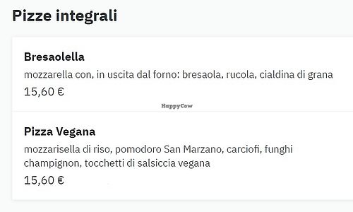 "Pizza Vegana" with tomato, vegan cheese, artichokes, mushrooms and chunks of vegan sausage. at Doppiozero Farina & Passione in Quattromiglia