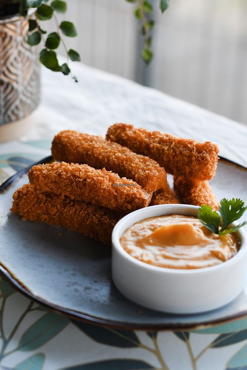 Tofu Sticks ~ con dip de cheddar vegano. at Nicolita Cocina Veggie in Buenos Aires