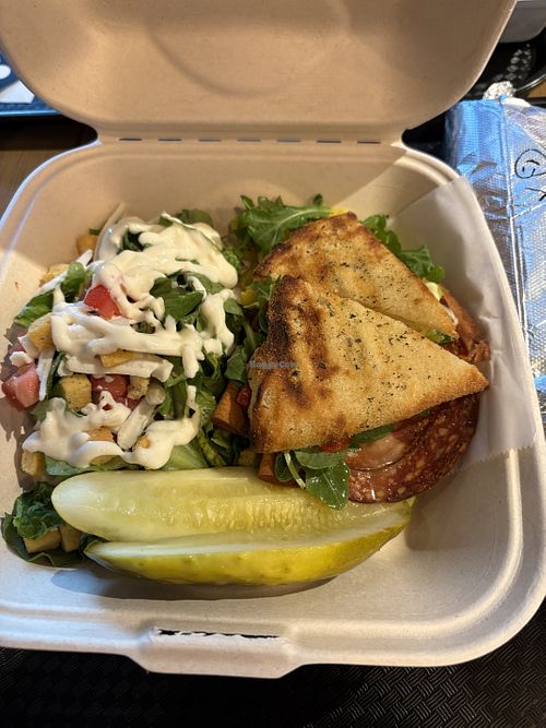Vegan Italian sandwich with pickles and side salad   at Redlands Natural Market in Redlands