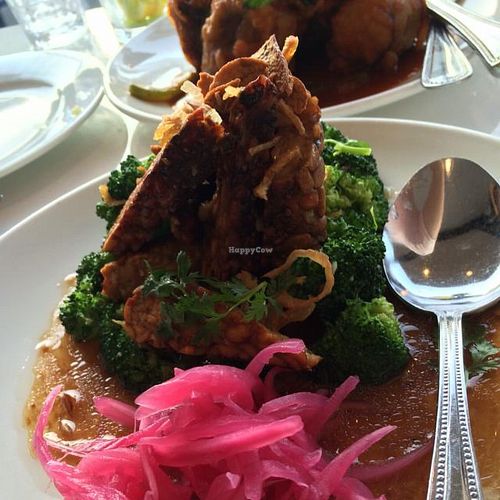 SUPER SAVORY SHALLOT BROCCOLI AND TEMPEH at Satdha Plant Based Thai Kitchen in Santa Monica
