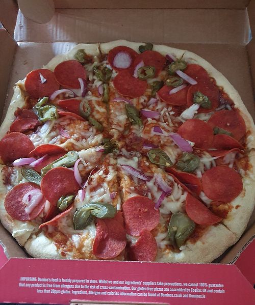 Plant-Based American Hot - Green Jalapeños, Onions, Plant-Based Soya & Wheat Pepperoni, Domino's Own Tomato Sauce and Plant-Based Cheese Alternative at Domino's Pizza in Wilmslow