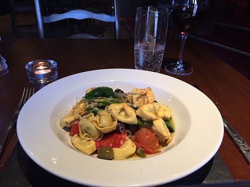 ricotta ravioli with asparagus and cherry tomatoes  at Nico's in Inverness