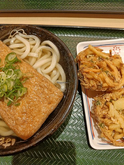 Left Kitsune (tofu) Udon. Right vegetable tempura. Just outside the picture: one piece of tofu sushi (Inarizushi) at Hanamaru Udon in Tokyo