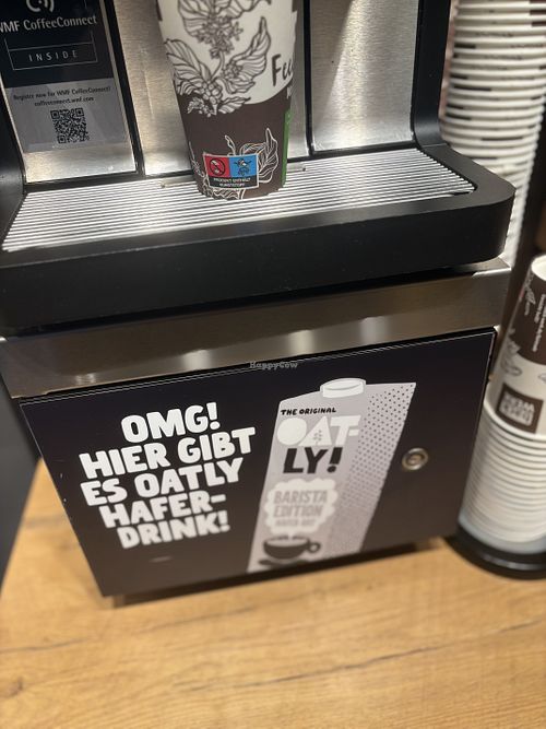 The oat milk operated coffee machine is the 3rd one after the entrance (right before the food section begins)  at backWERK in Dresden
