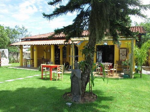 Outdoor seating at Aldeia Indigo in Florianopolis