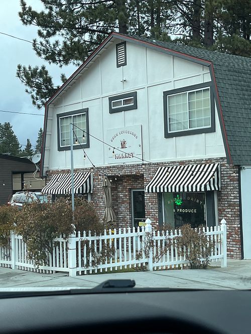 Front of the market. Outdoor seating.  at Bear Cupboards Market in Big Bear Lake