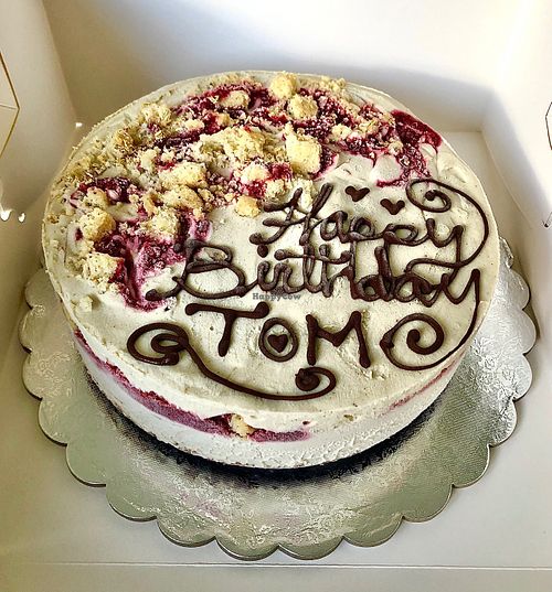 Jam ripple cheesecake ice cream cake with chocolate truffle chunks and chocolate biscuit base.  at Iced Out  in Dubai