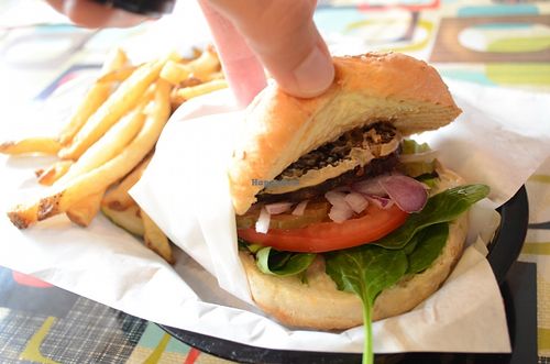Tempeh burger (delicious patty) & fries & pickle at Afternoon Deli in Grass Valley