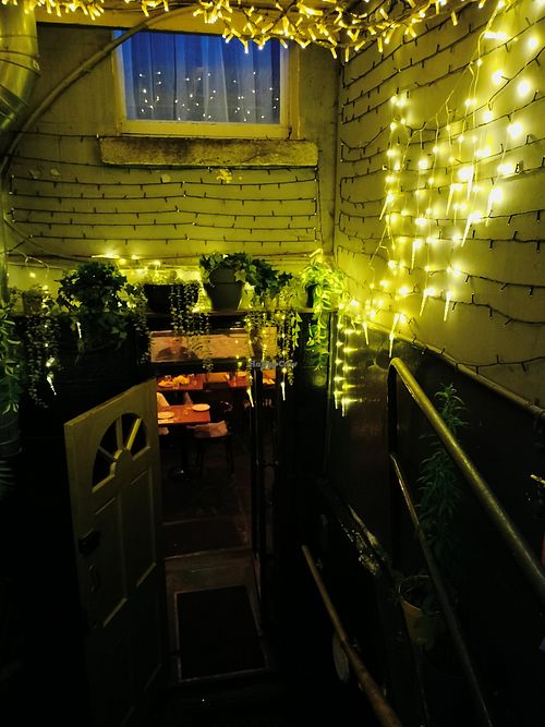 The entrance - easy to miss. The bathroom is also outside. at El Celler in Blackrock