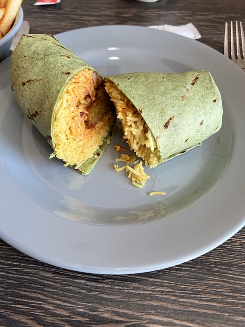 Spinach falafel roll wrap with hot Peri sauce and no garlic sauce  at Vasco's Peri Peri in Arlington Heights