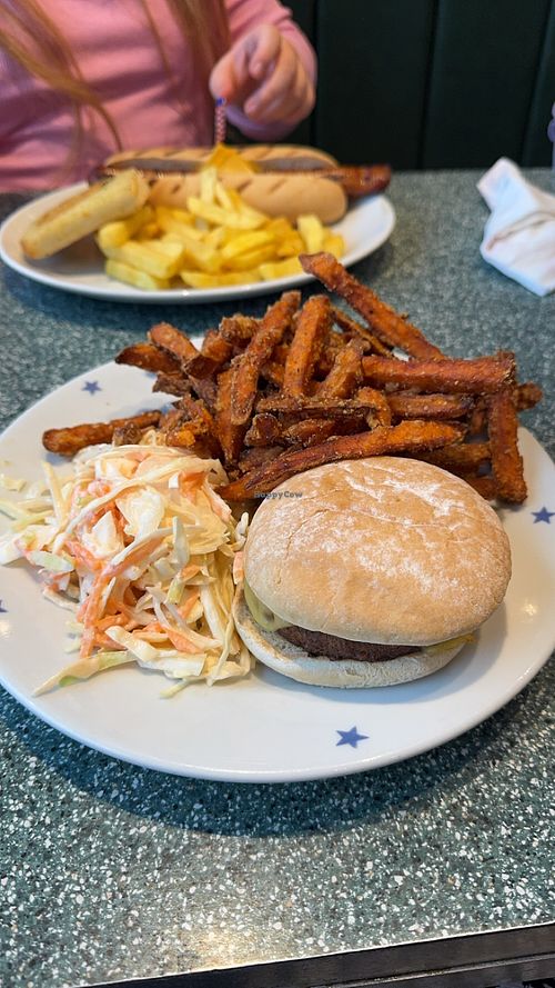 Moving mountains burger and sweet potato fries with vegan coleslaw   at '81 Hamburger Heaven in Northampton