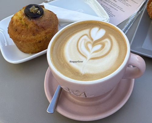Vegan orange cake and oat milk cappuccino   at Monogram Roasters in Crete