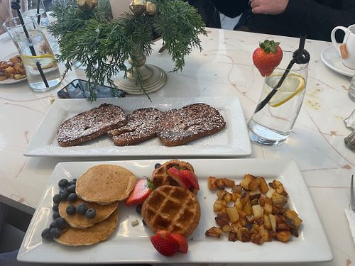 The lovely folks at First Bite Grafton made us the beautiful breakfast on request of vegan French toast, pancakes, waffles, and home fries.  at First Bite Grafton in Grafton