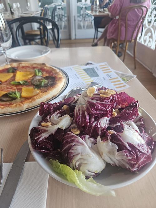 Radicchio salad and super Mario pizza with vegan cheesee  at Farm Vigano in Melbourne
