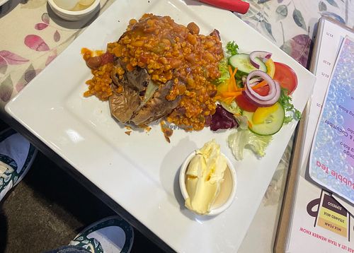 Jacket potato with vegan chilli, vegan butter alternative and side salad at Chillipetals in Newark