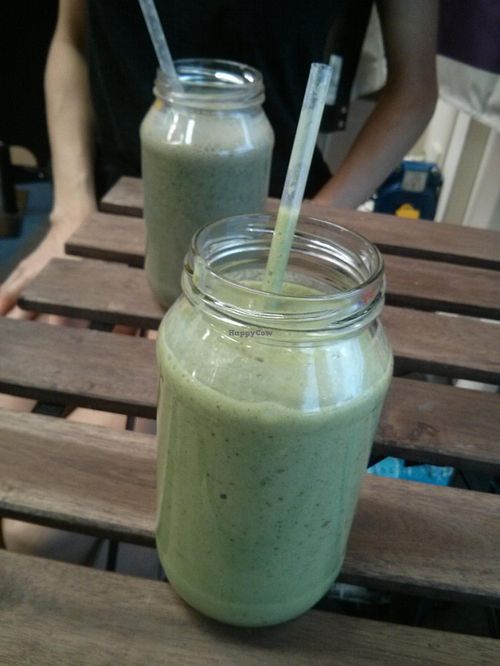 Green smoothie, and Superfoods smoothie in the background at 48 Degrees Raw Cafe in Brisbane