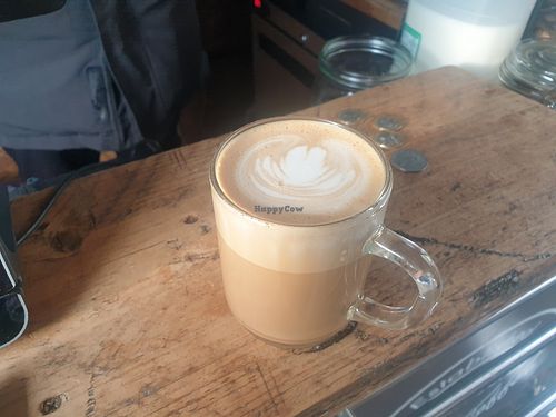 Oatmilk flat white at the Bike Garden. at Northern Slice Coffee in Newcastle Upon Tyne