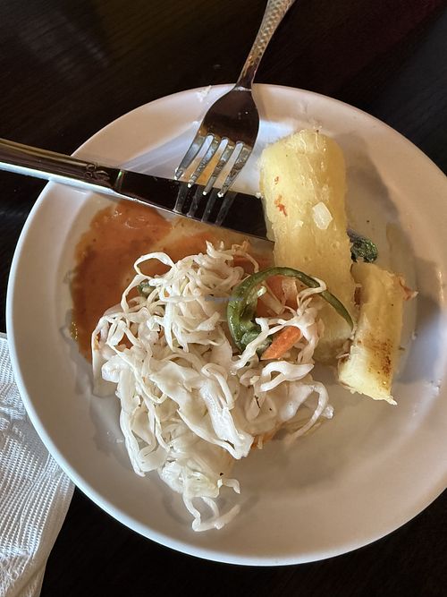 Yuca and slaw with some hot sauce  at Pupusas Paradise in Denver