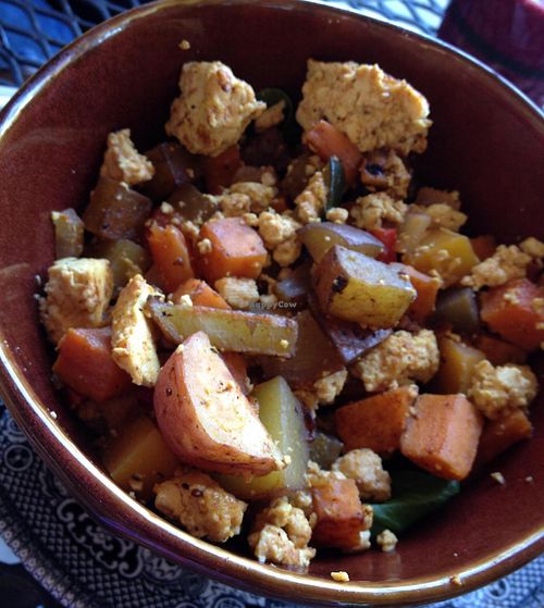 Vegan Breakfast Burrito (I requested it naked, and without the cheese)
Tofu scramble, spinach, seasonal vegetables, house bacon, apple soyrizo hash & garlic aioli 
(I couldn't find the bacon) at 24 Carrots in Tempe