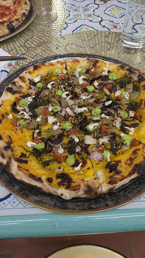 Pizza trevisana, friarielli e crema al basilico at SANTATERESA in Venice