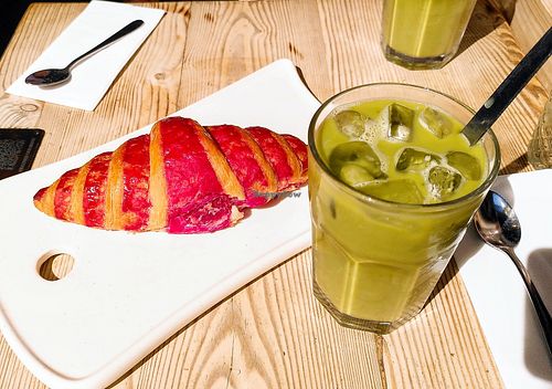 Matcha latte and hibiscus croissant (all vegan) at Le Pain Quotidien - Victoires in Paris