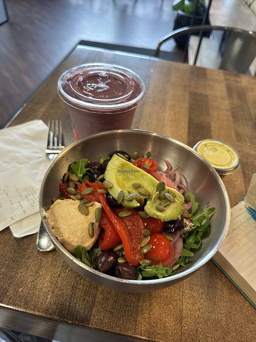 Berry smoothie w Hemp protein & harvest grain bowl  at THORN + ROOTS in Saratoga Springs