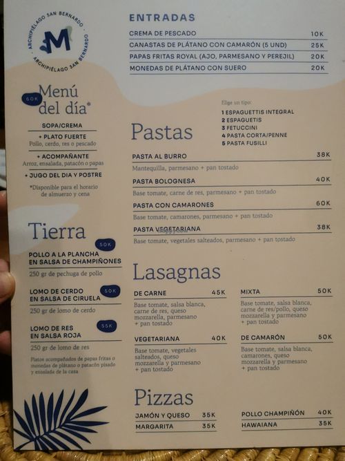 Menu with vegetarian/vegan lasagna and pasta at Múcura Club Hotel in Mucura Island