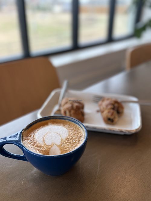 Coconut milk latte and vegan walnut loaf   at Airship Coffee - Pumphouse in Bentonville
