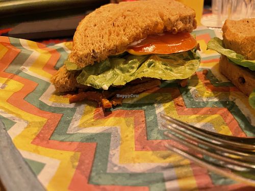 Not the best photo of vegan BLT—taken after taking a few bites of the first half of sandwich and  adding some extra condiments (not that it needed it!)  at Lounges - Candelo Lounge  in Thame