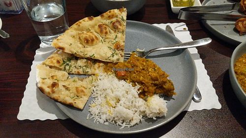 Baigan Bartha (vegan) eggplant based entree, and garlic naan (vegetarian) at Indian Delight in Portage