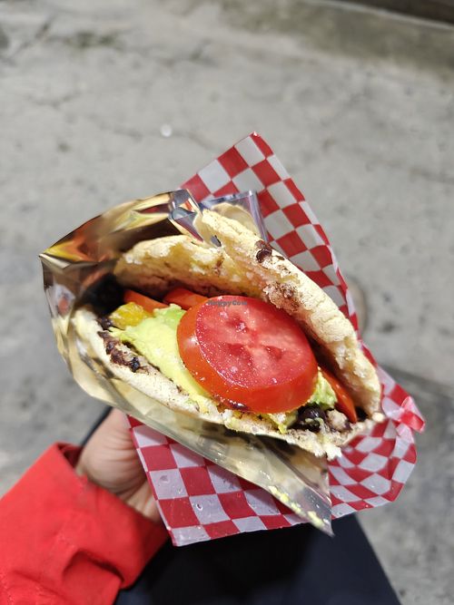 Vegan arepa with tomato, platano, avocado & black beans at Deliciosas Empanadas Venezolanas in Salento
