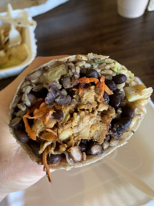 Jerk wrap…tasty but a little spicy.   at Nectar Cafe in Auburn