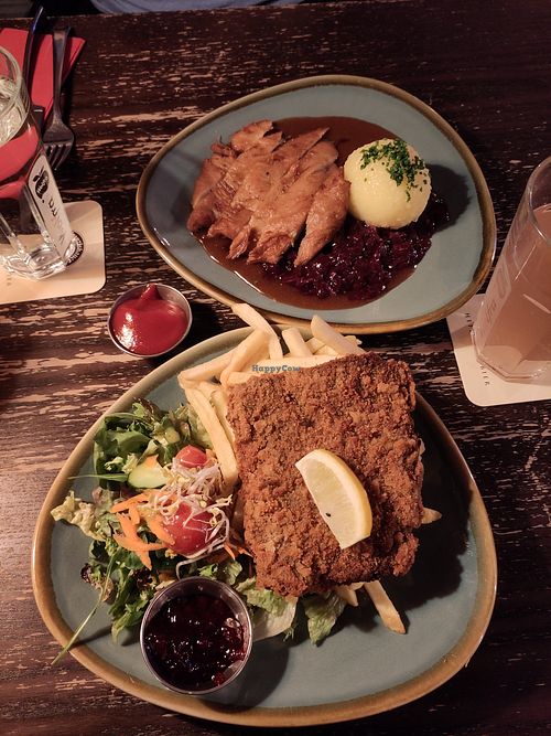 Schnitzel (bottom) and duck at Bodhi in Munich