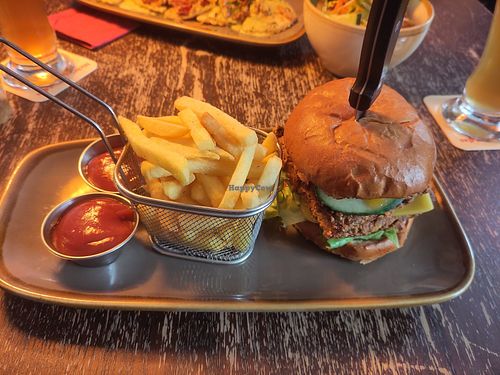 Tempeh burger (with extra patty and cheese) and fries at Bodhi in Munich