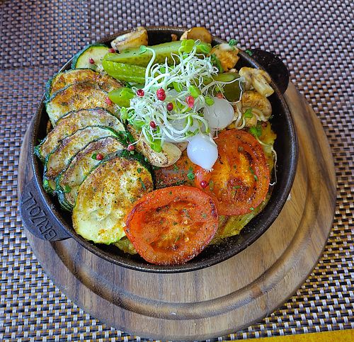 The Rösti is hidden under all the grilled vegetables! at Fein Restaurant in Leukerbad