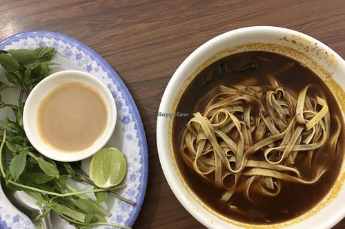 Special noodle soup, which came with fresh greens, sauce and lime on the side. The soup was not that spicy but very flavourful with bean sprouts, mushroom brisket and veggie ham.  at Maitreya Healthy Vegetarian Restaurant in Phnom Penh