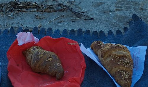 Croissant with orange filling (right) and apple cinnamon (left) at Pasticceria Reale Caffetteria in Rimini