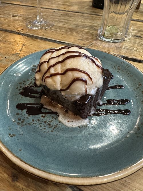 Vegan and gluten free chocolate orange brownie with vegan ice creamm  at The Portland Arms in South East London