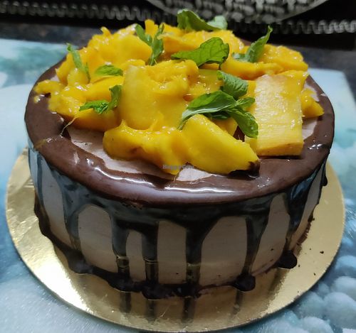 Mango chocolate vegan cake at Cake Lake Nagpur in Nagpur